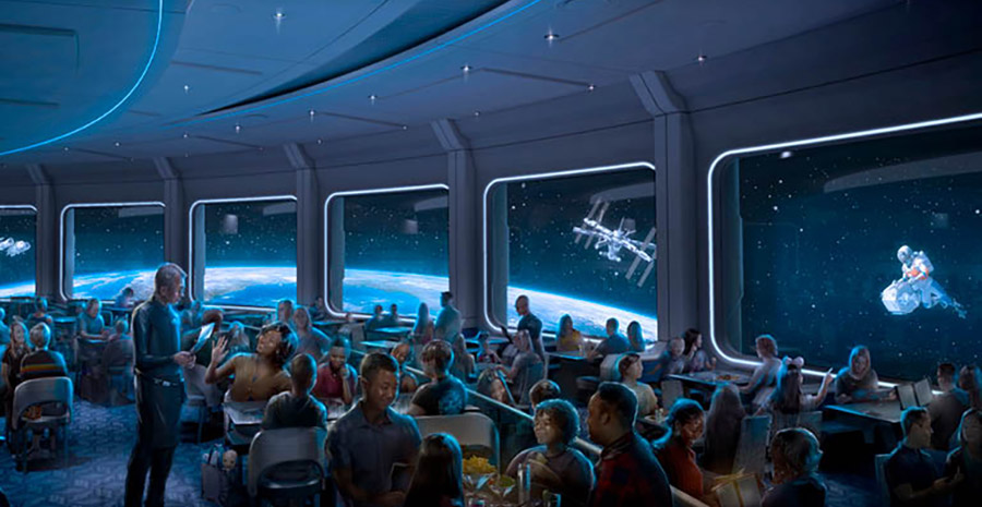 A futuristic dining room with a simulated view of space in the background.